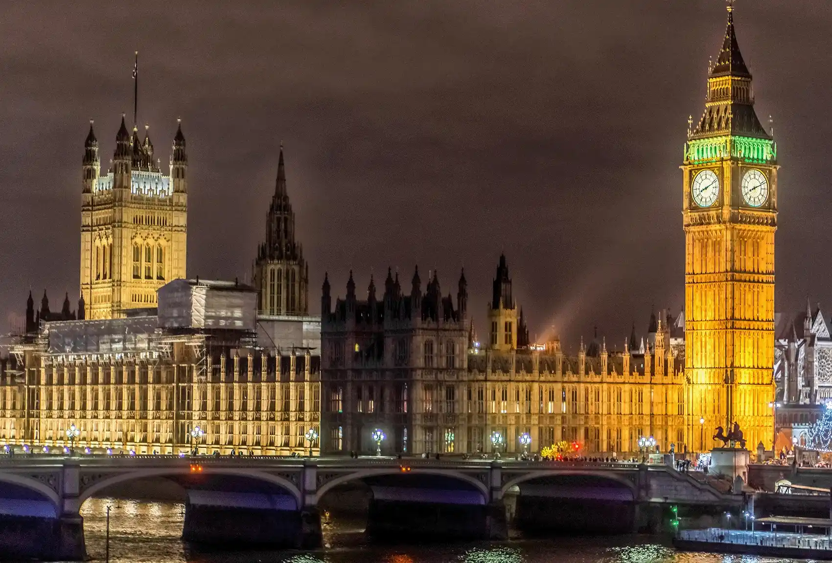 The Big Ben in the night lit up. The Big Ben glamouring at night.