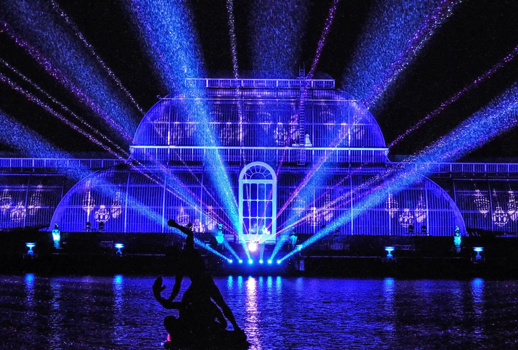Experience the magical light display and festive environment at Kew Gardens during Christmas, London, England, for the entire family. Christmas lights at Kew Gardens Illuminated festive light trail.
