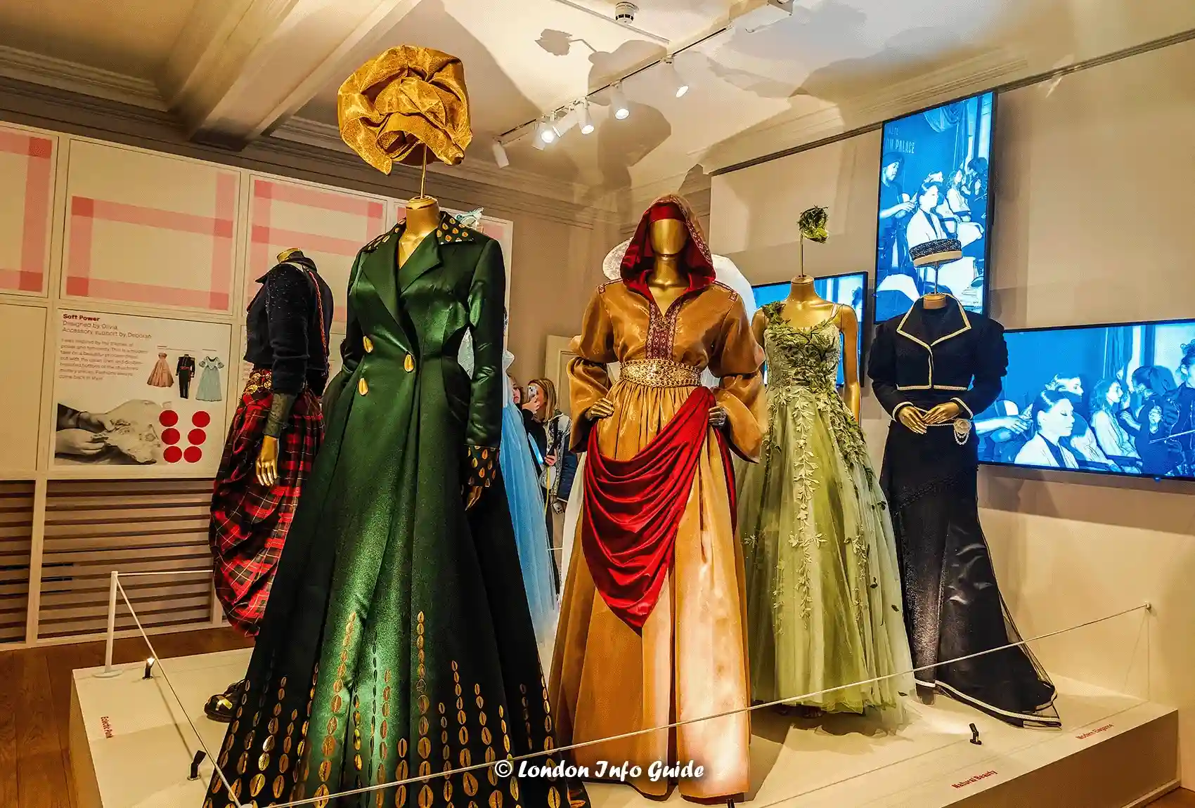 Modern designers reinterpreting royal dress codes in exhibition.