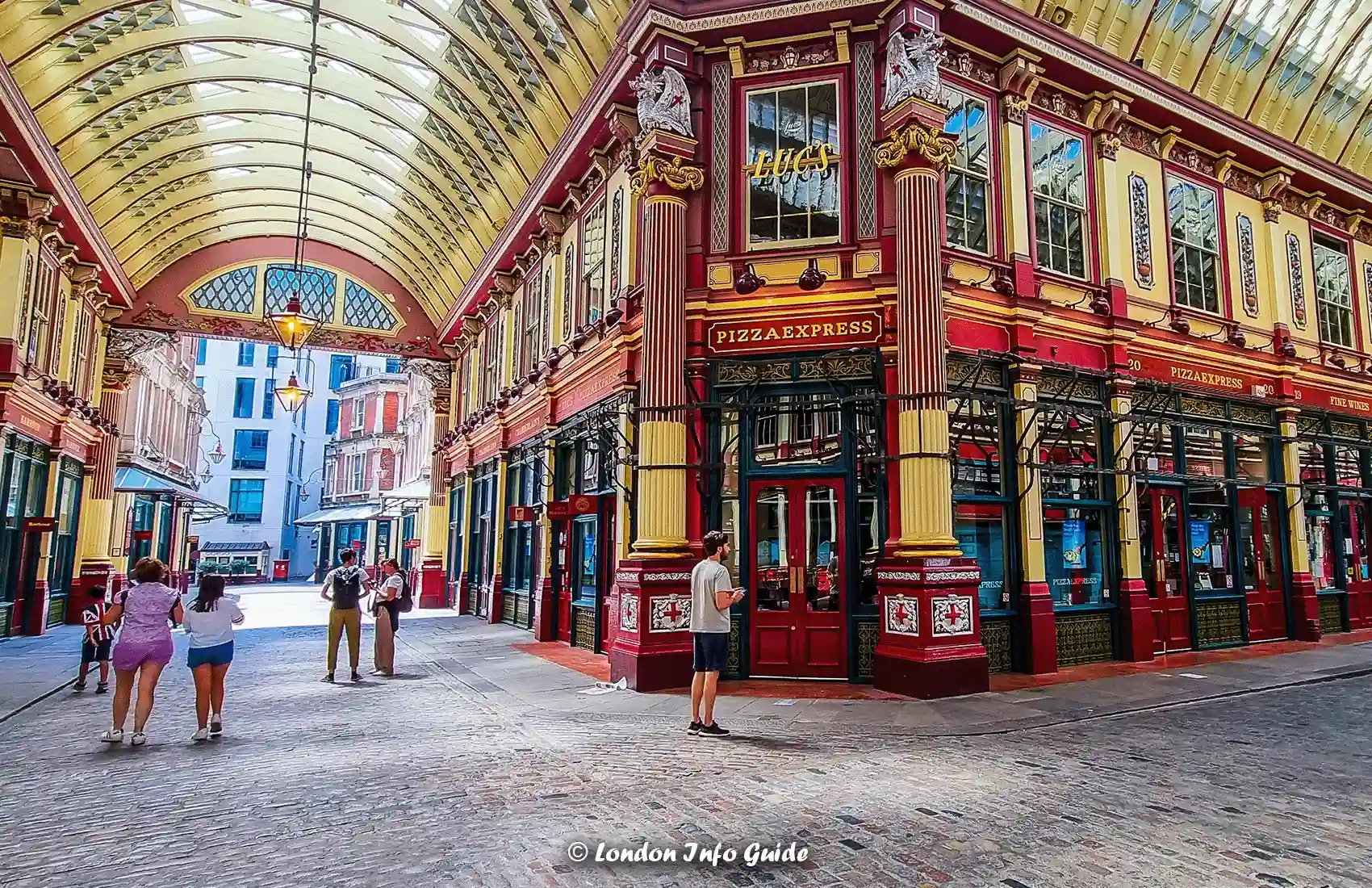 People walking around Leadenhall Market.