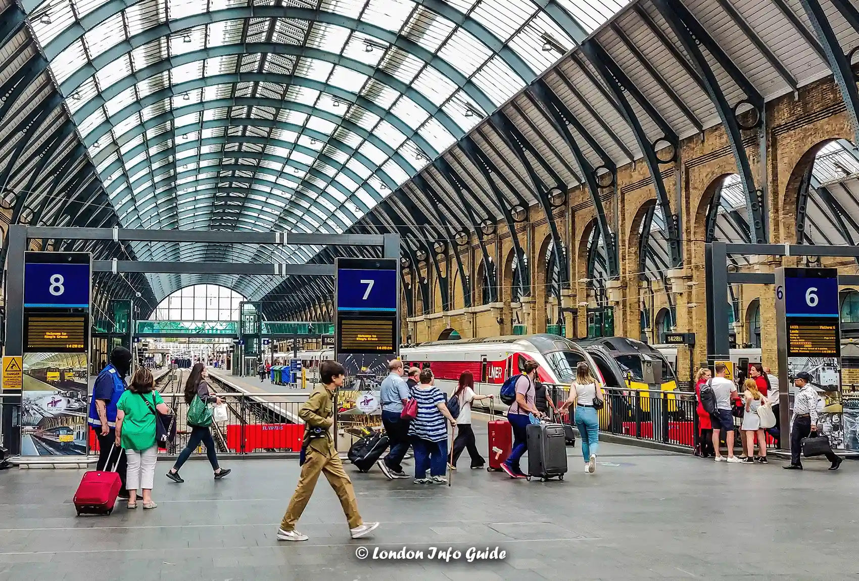 King's Cross Station in London, UK, a major railway hub known for its iconic architecture. King's Cross Station London, UK