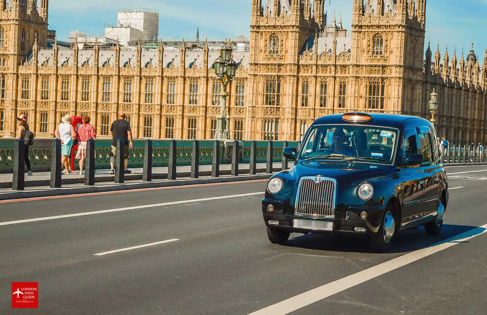 A London Black Cab travelling over the City of Westminster Bridge London. A London Black Cab travelling over the City of Westminster Bridge London.