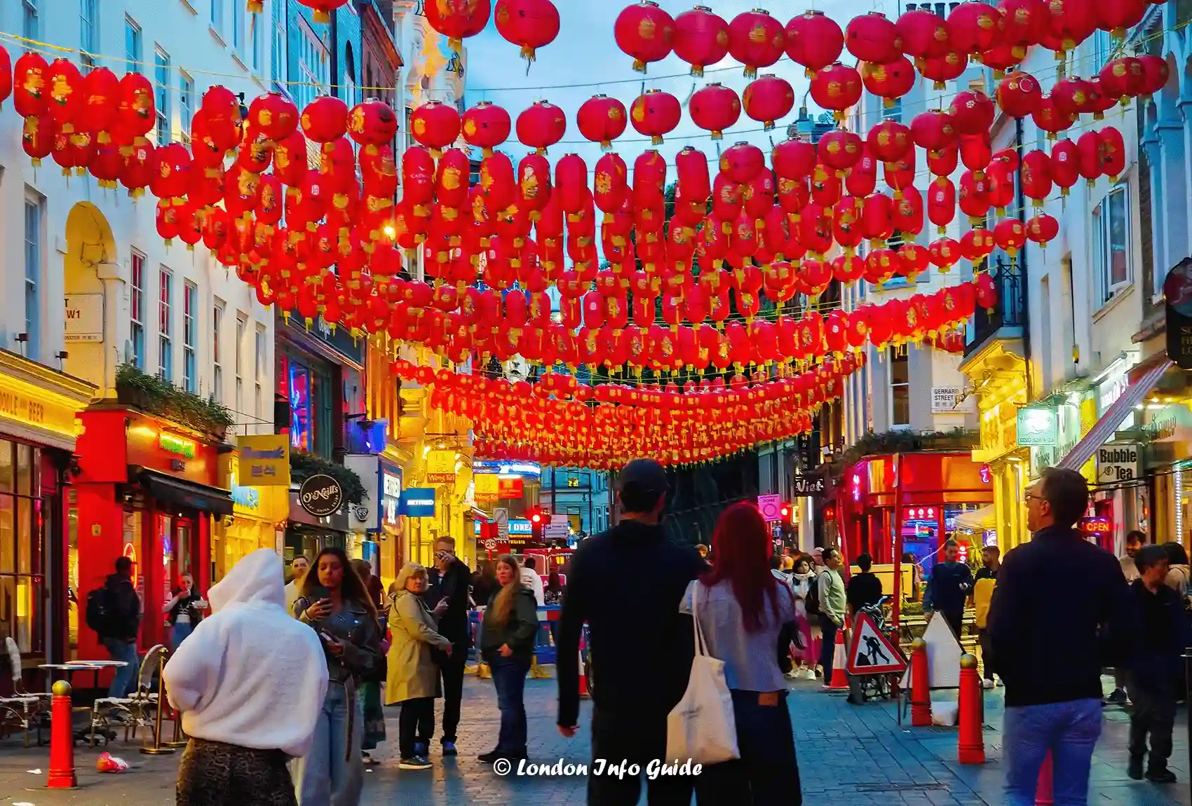 Chinatown London lanterns at dusk in February – Soho street scene for London events guide.