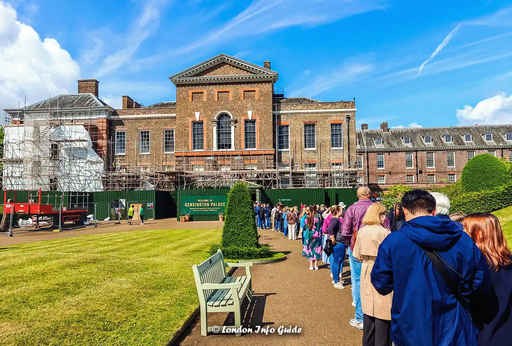 Visitors queue outside Kensington Palace in London during renovation works.