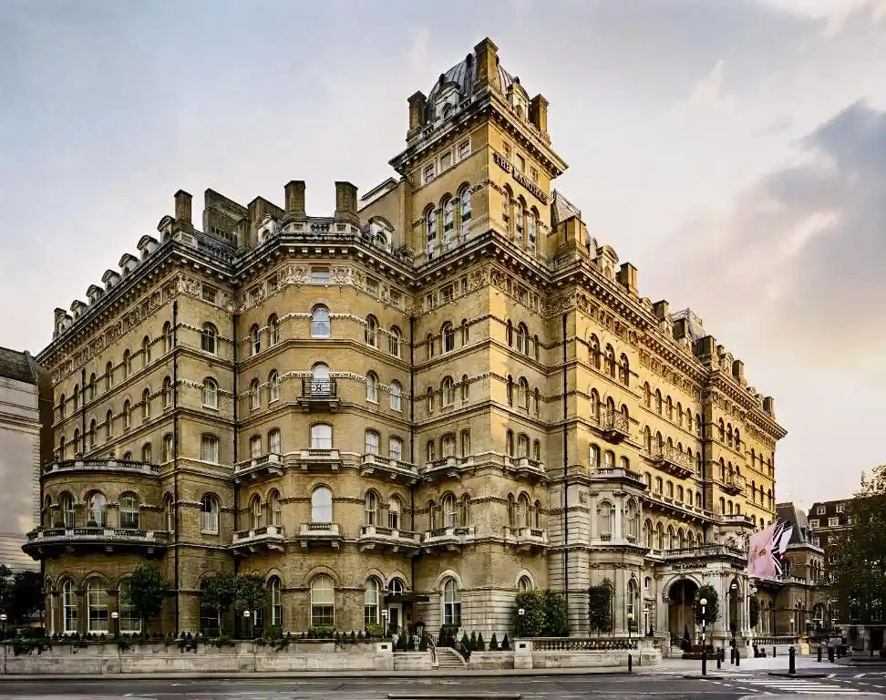 Grand exterior of The Langham Hotel in London with classic architecture.