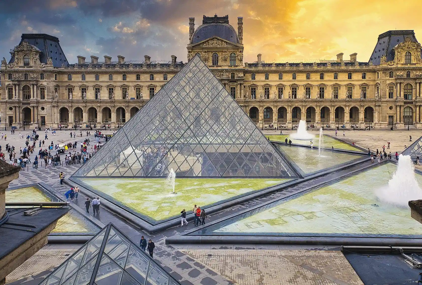 The Louvre Pyramid In The Main Courtyard Of Louvre Palace.