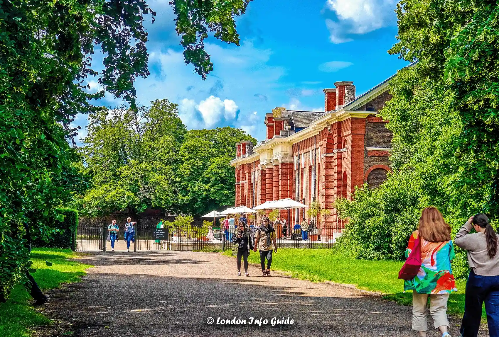 Walking through Kensington Gardens towards Kensington Palace's Orangery