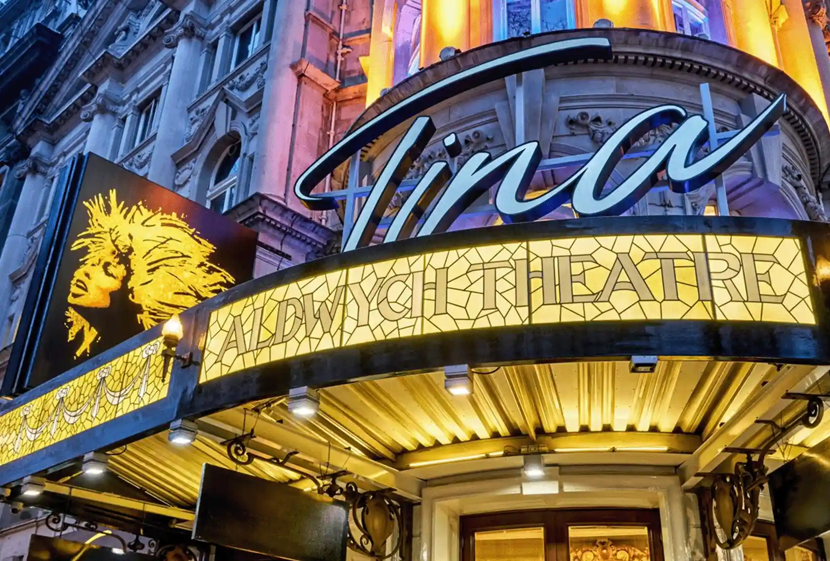 Aldwych Theatre in London with Tina Turner the musical Londdon, with signage outside the theatre.