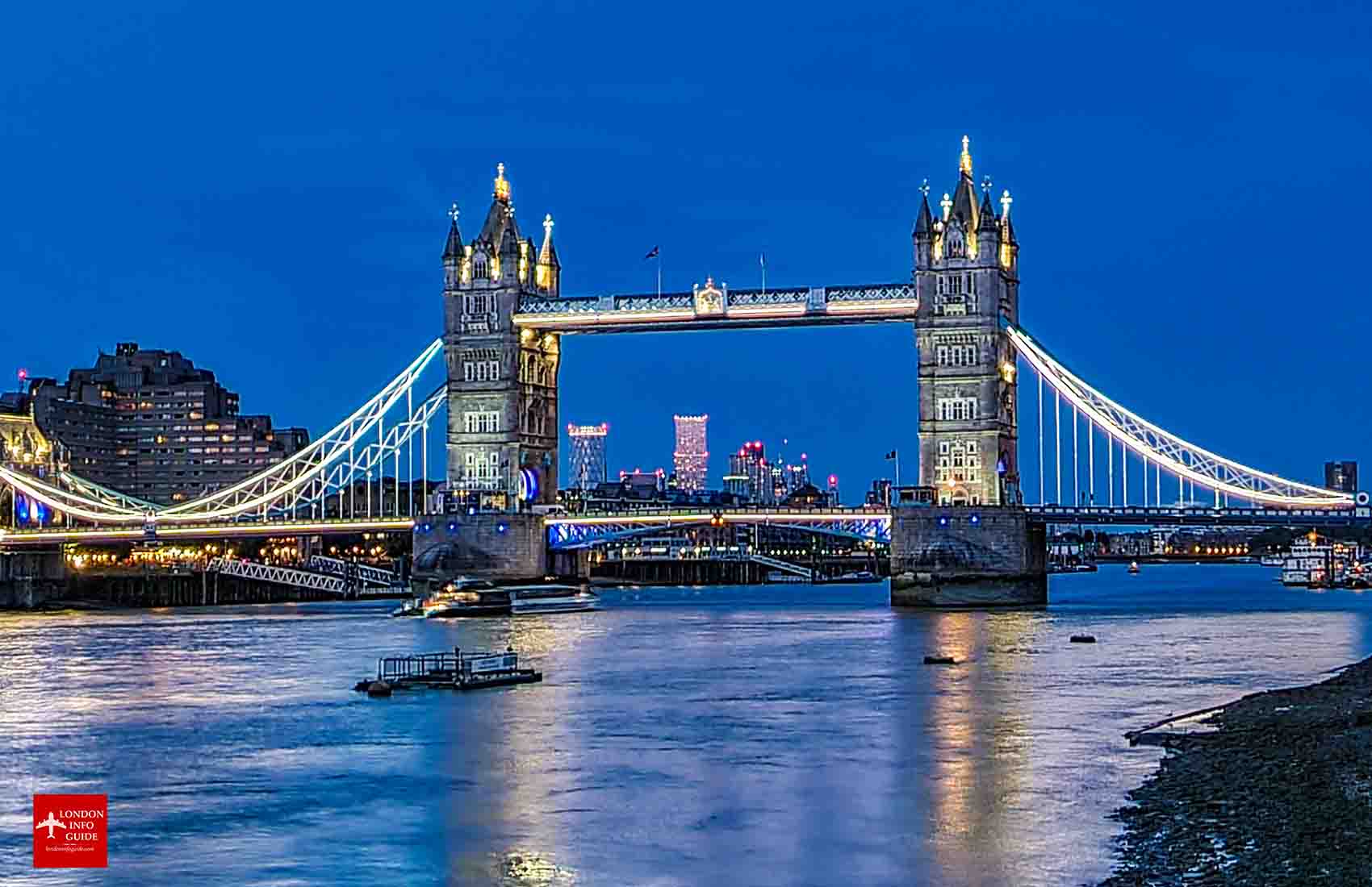The Tower Bridge all lit up just a little after sunset. Tower Bridge in the evening.