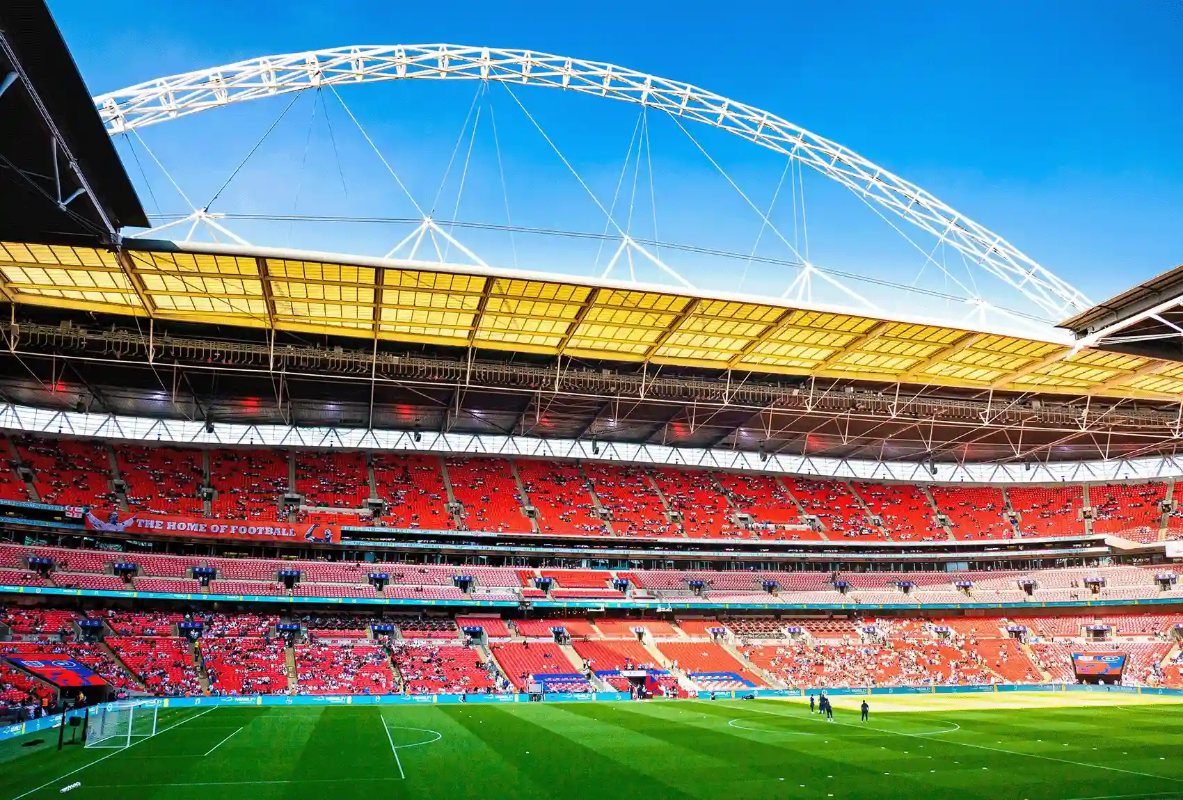 Wembley Stadium seating and pitch view for big London events.